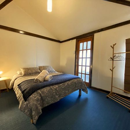 Kawi Hostel Пуерто-Наталес Екстер'єр фото